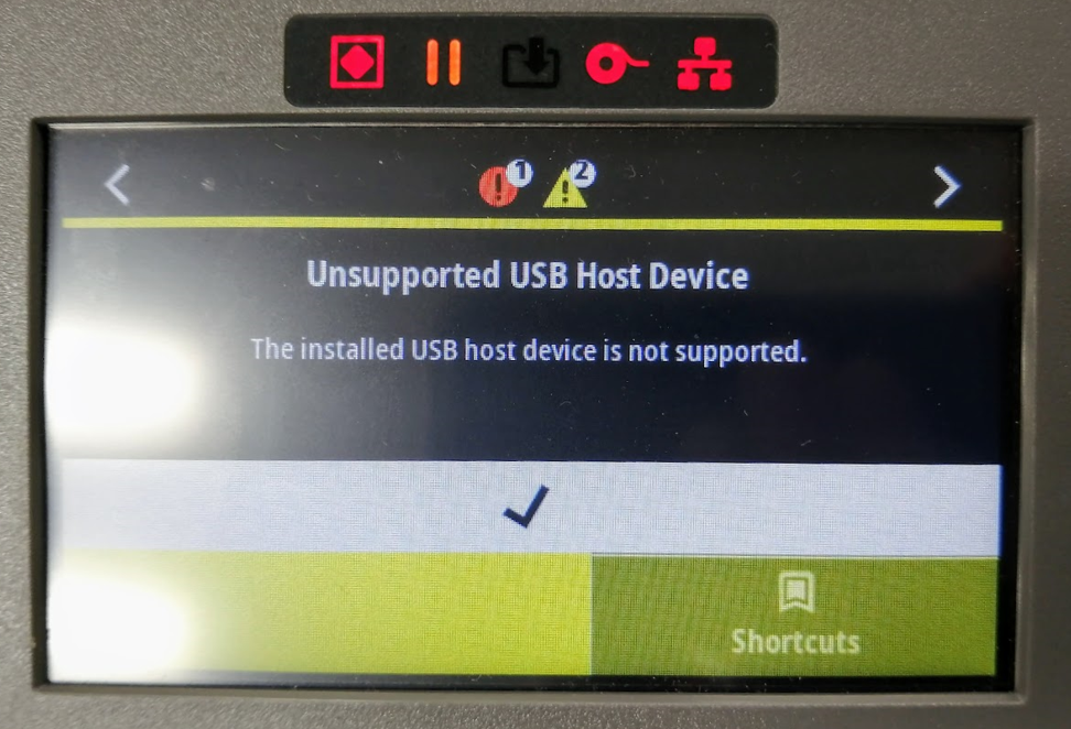 Warning Message (”Unsupported USB Host Device”) Displayed on the
